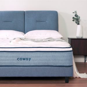 front-view-of-coway-prime-lite-series-mattress-with-complete-bedsheets-and-a-blue-bedframe-along-a-side-table-with-a-plant